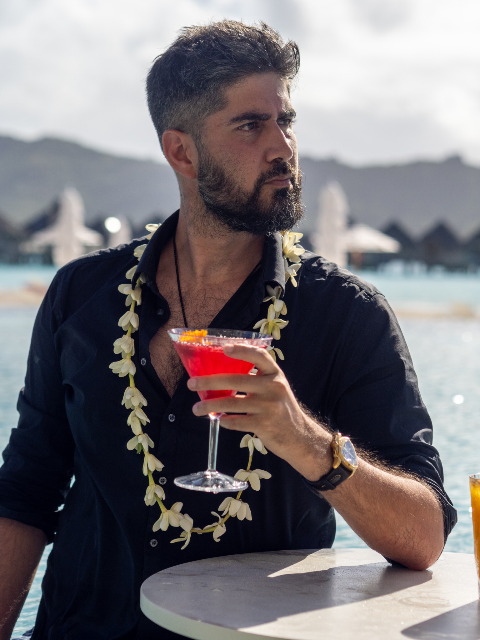 Alex Black with a cocktail at the Westin Bora Bora