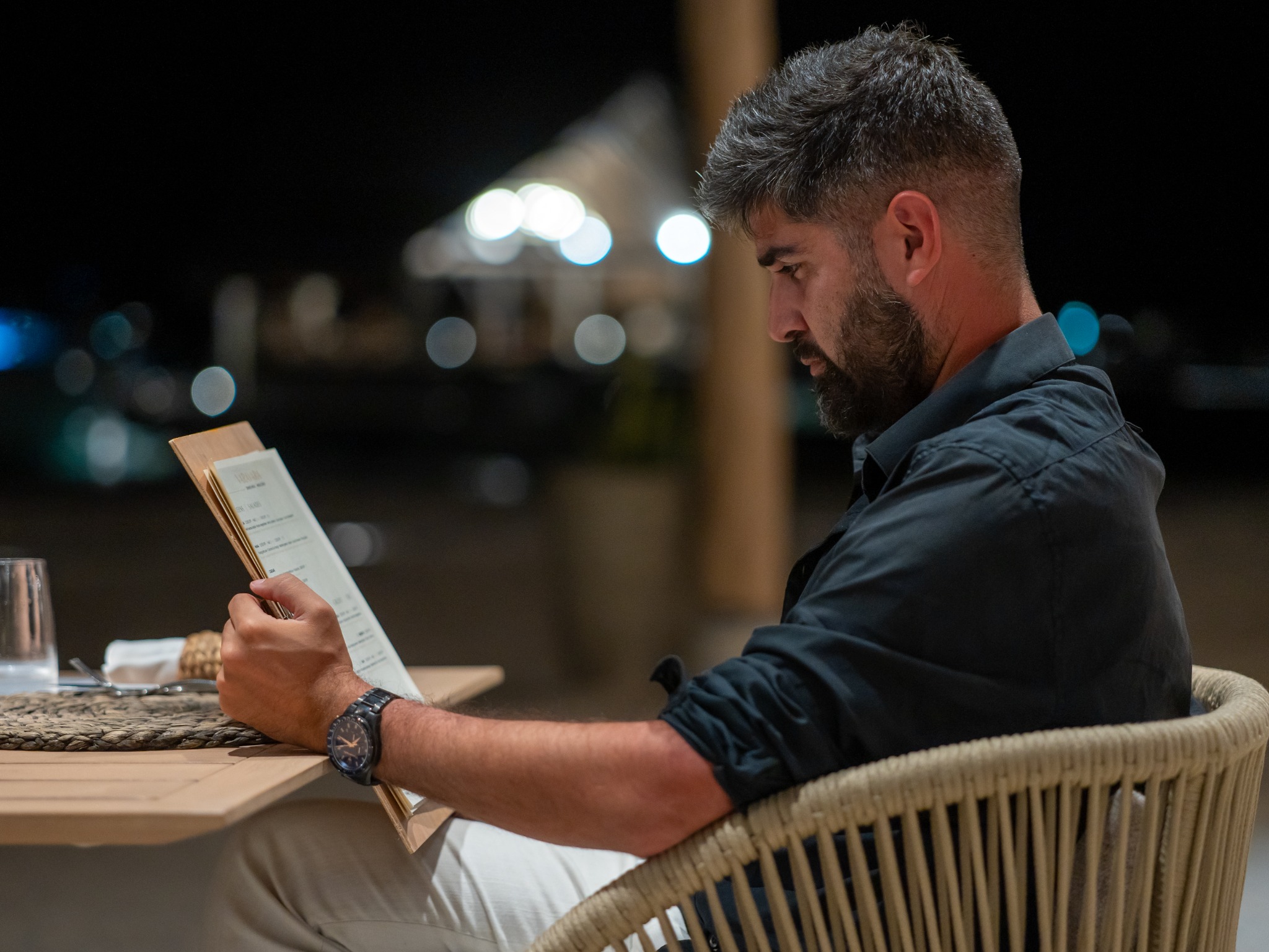 Alex Black reading the dinner menu at the Westin Bora Bora